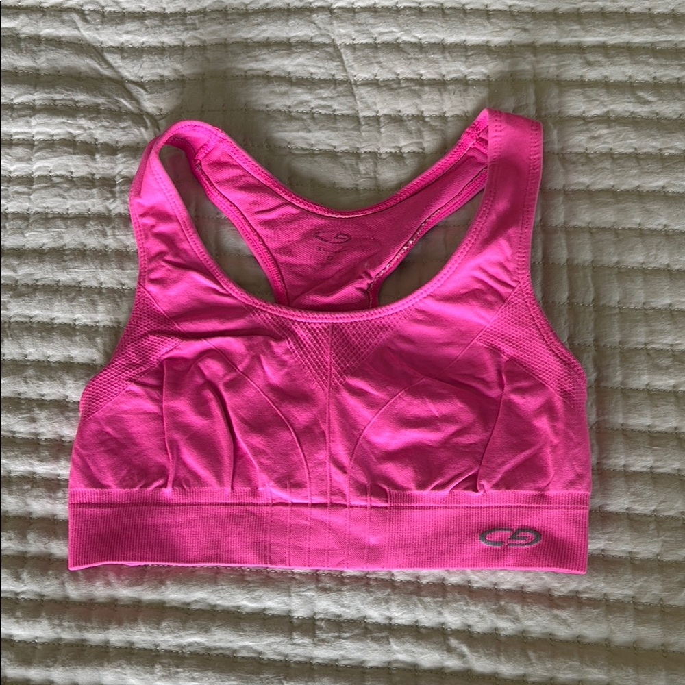Vibrant Pink Racerback Sports Bra with Moisture-Wicking Fabric